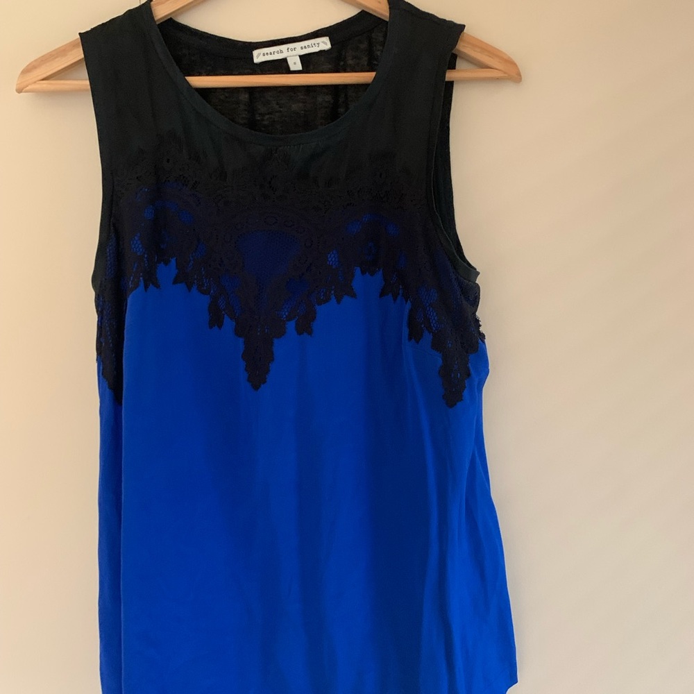 Cobalt blue tank top with black lace detailing